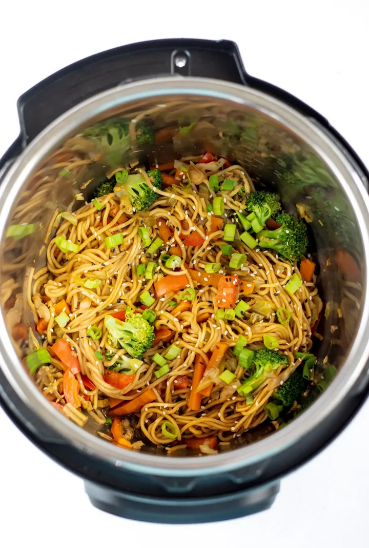 Overhead image of cooked vegetable lo mein inside an Instant Pot