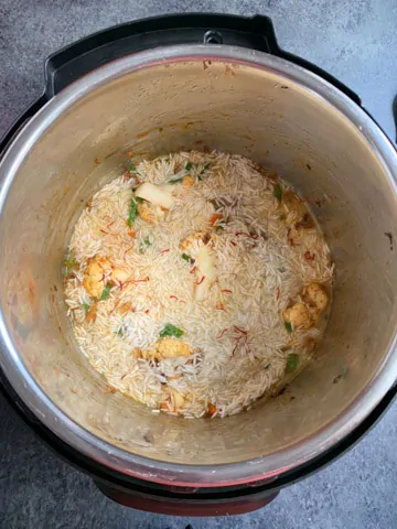 Rice topped with saffron to make biryani