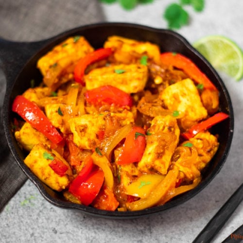 Paneer Jalfrezi curry with peppers in a pan