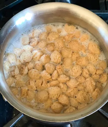 Soya chunks being boiled in water