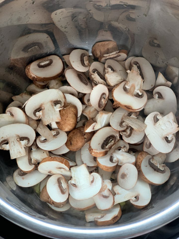 creamy mushroom pasta instant pot steps - Piping Pot Curry-1 Sliced Mushrooms in the instant pot steel insert