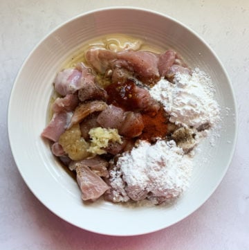 1. Marinating Chicken for Chilli Chicken - Piping Pot Curry Ingredients to marinate chicken in a bowl