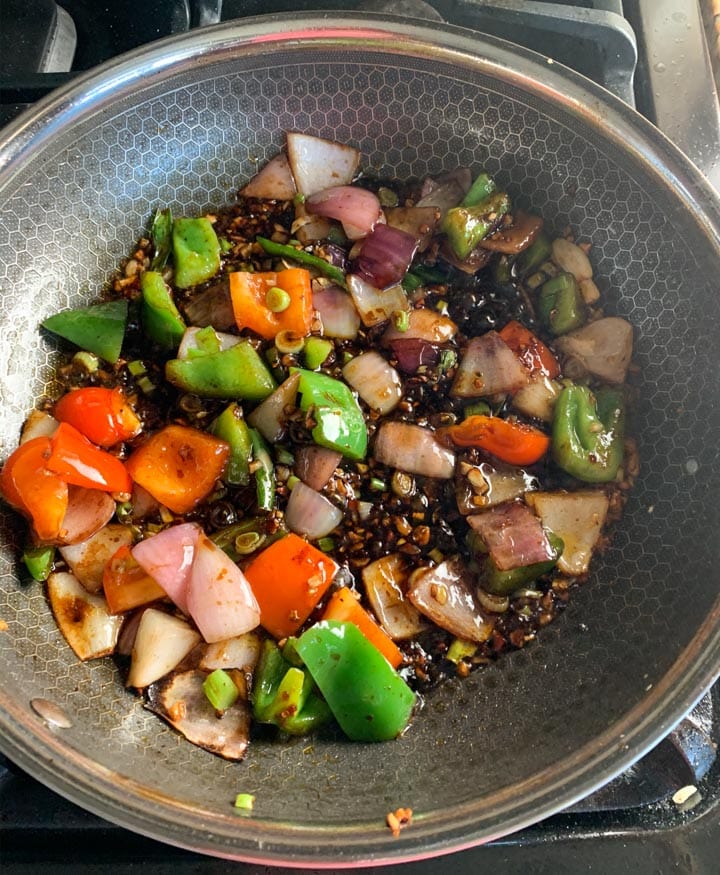 10. Sauce for Chilli Chicken indian style - Piping Pot Curry Chinese sauté with sauce, onions and colorful bell peppers