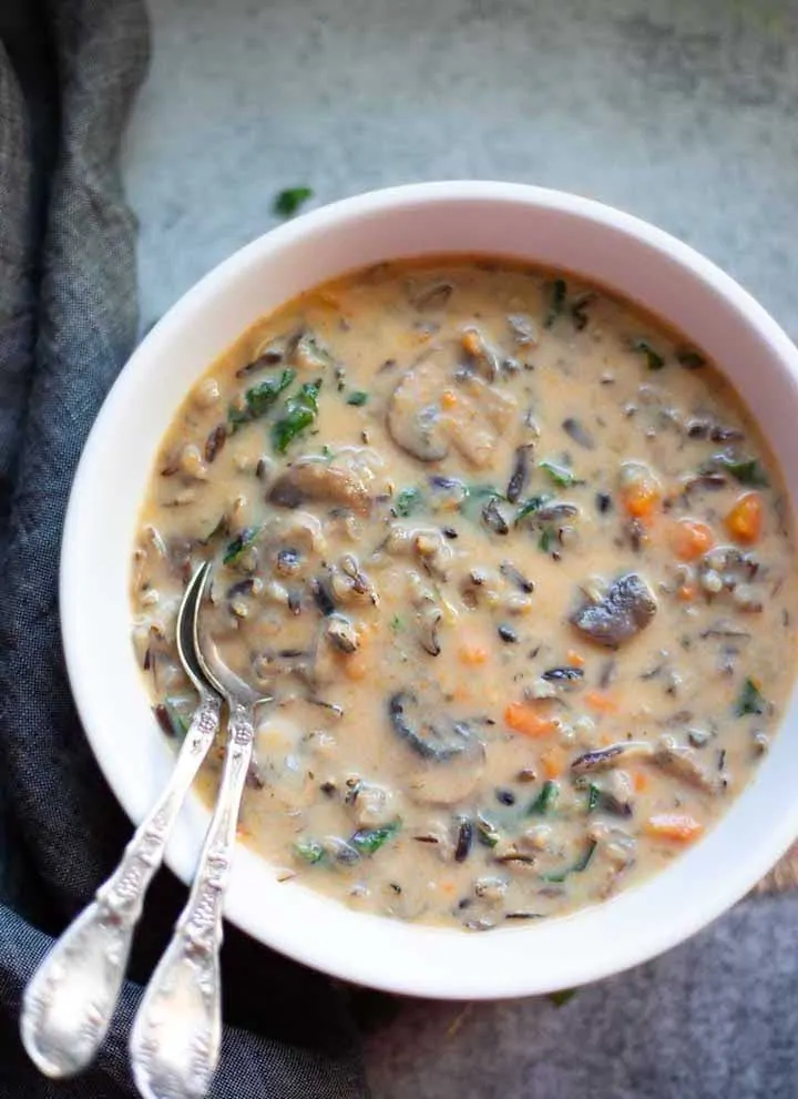 Mushroom wild rice soup in a white bowl
