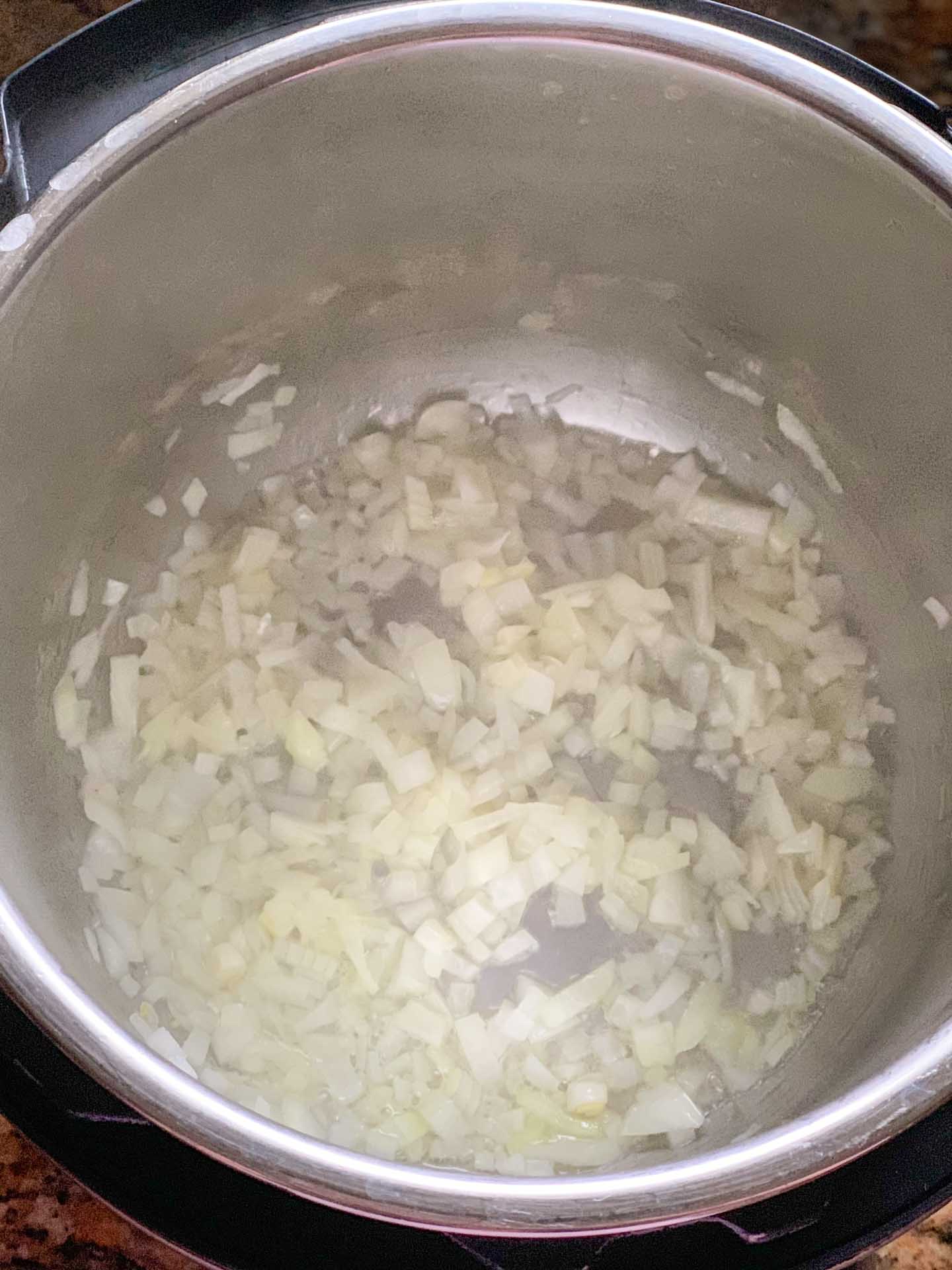 Chicken Tikka Masala Pasta Step 1- saute onions - Piping Pot Curry Saute onions in the instant pot