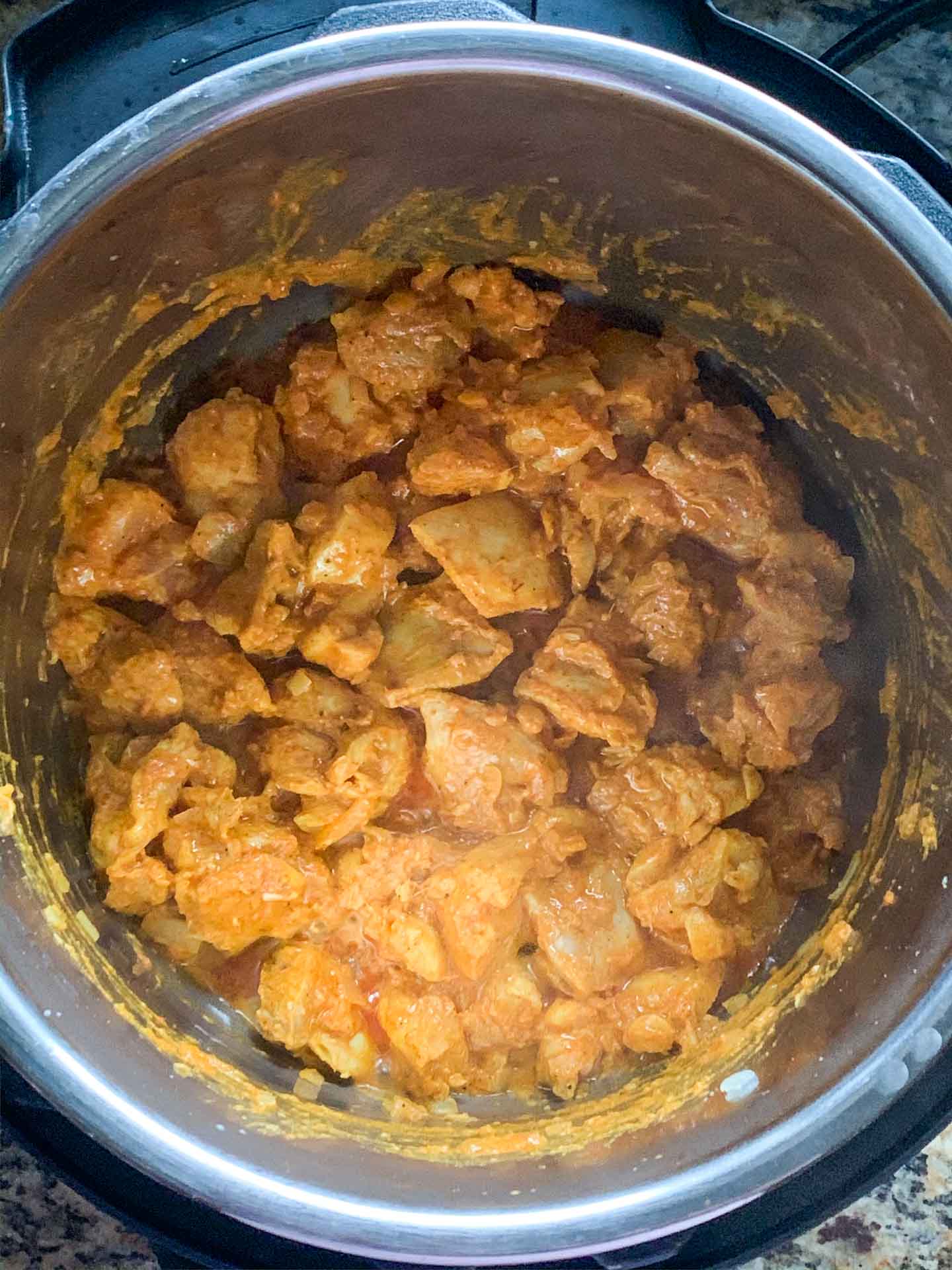 Chicken Tikka Masala spaghetti Step 2-saute chicken - Piping Pot Curry Saute marinated chicken in the pressure cooker