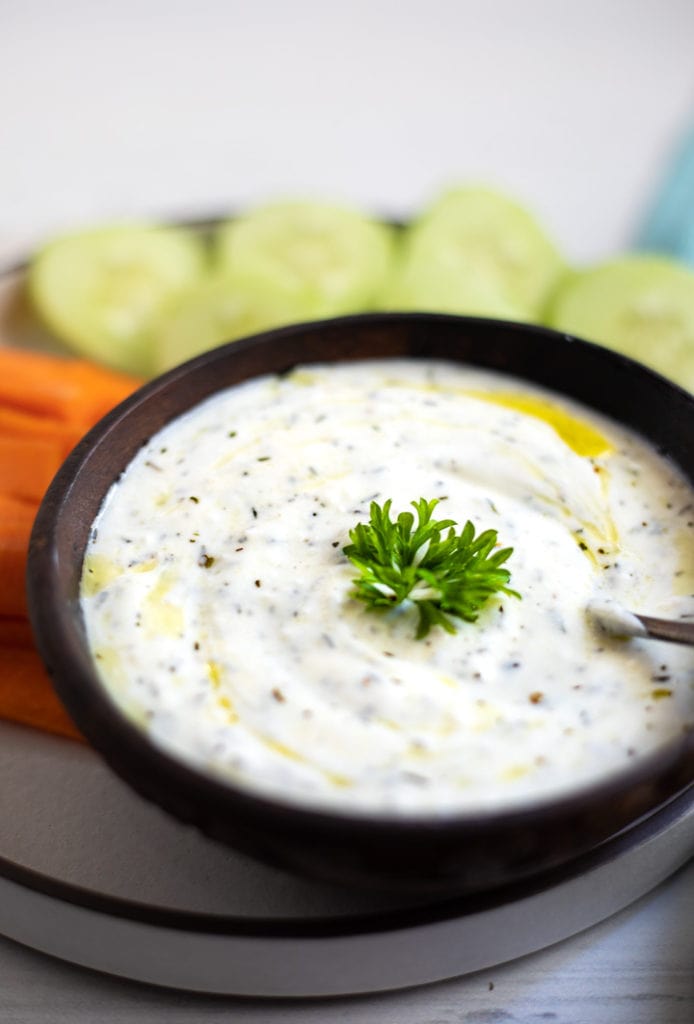 Yogurt dip with carrots and cucumbers 