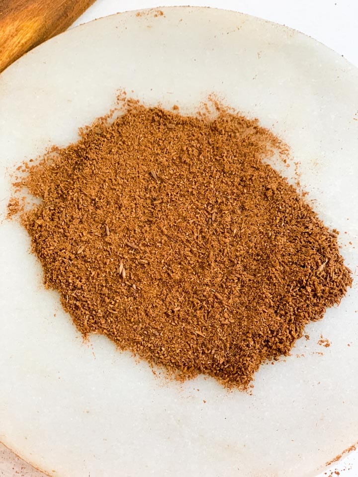 How to make roasted cumin powder - Piping Pot Curry-6 ground cumin on a marble base (chakla)