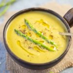 cream of asparagus soup in a soup bowl