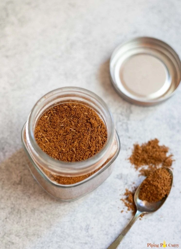 Ground cumin in an air tight glass container. 