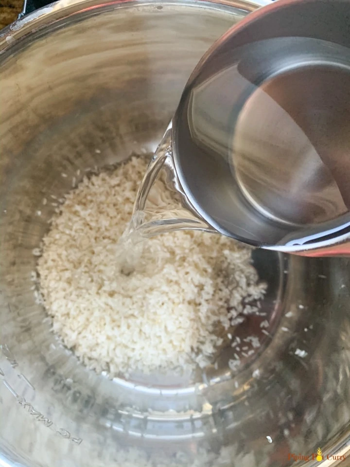 Adding water to white rice in instant pot