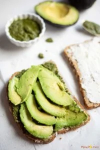 Sliced avocado on bread