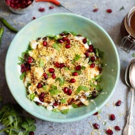 Dahi Papdi chaat in a green bowl