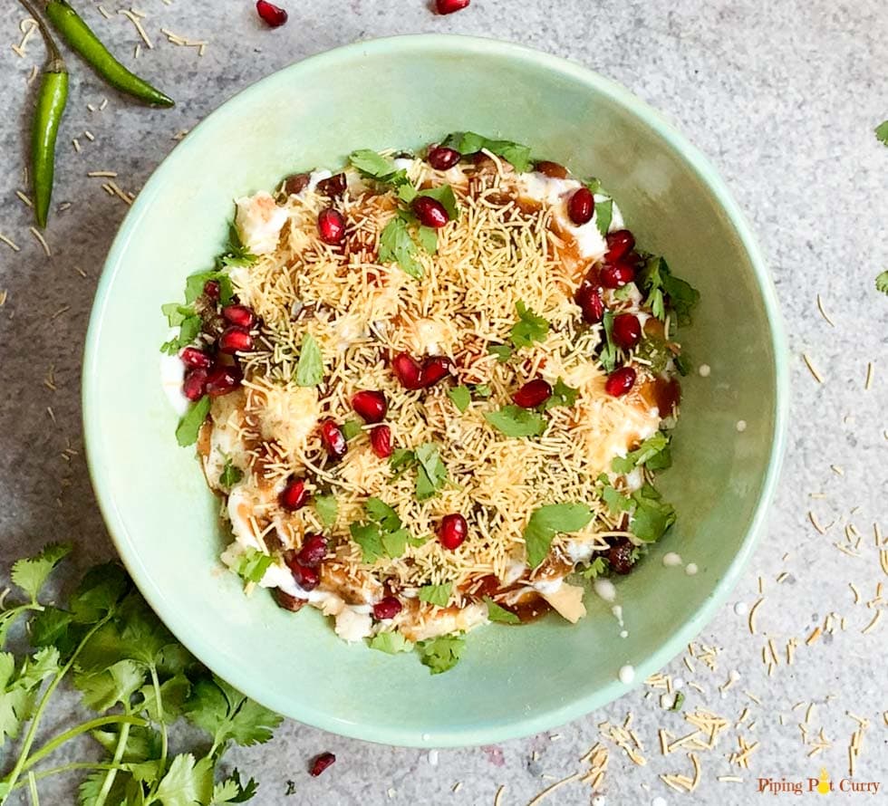 Sev topped on dahi papdi chaat