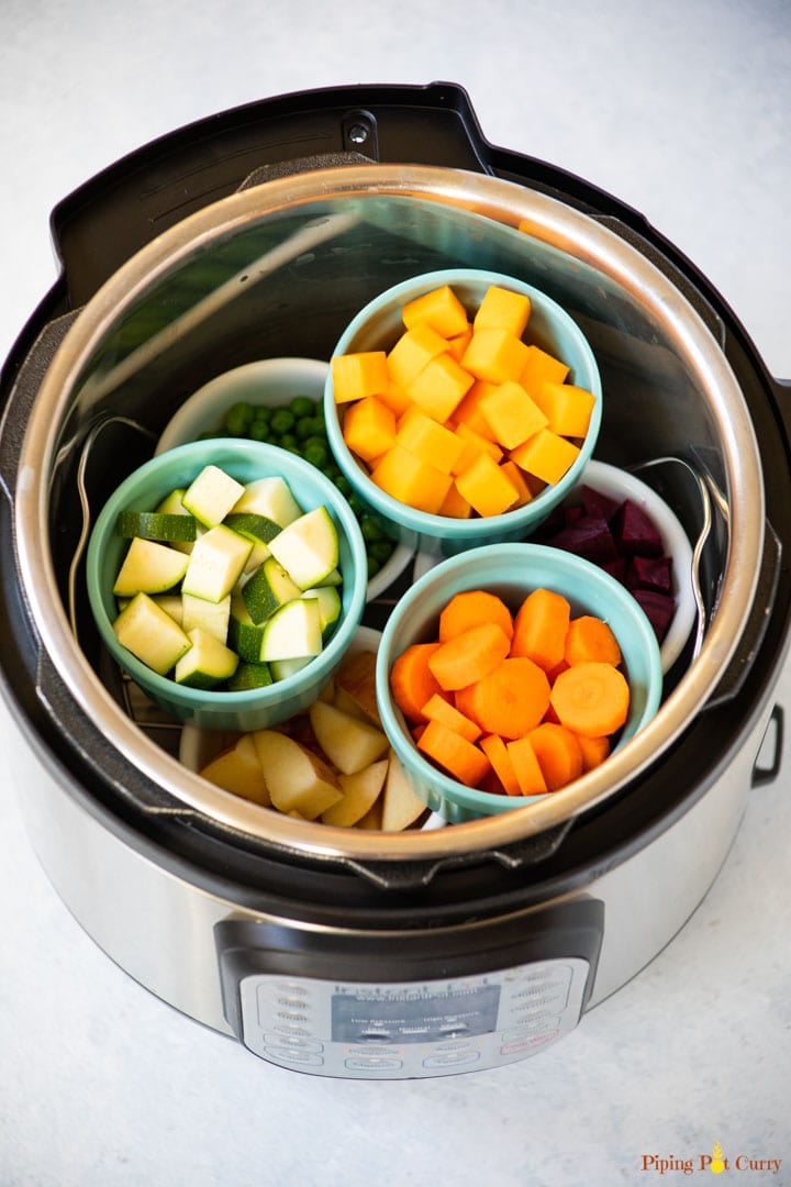 2 layers of ramekins with diced veggies to make instant pot baby food