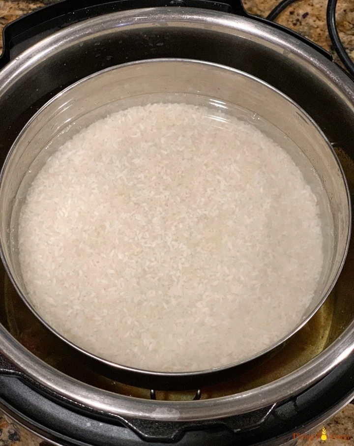 rice being cooked pot-in-pot
