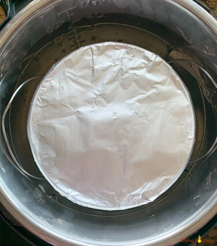 a pan covered with foil in the instant pot
