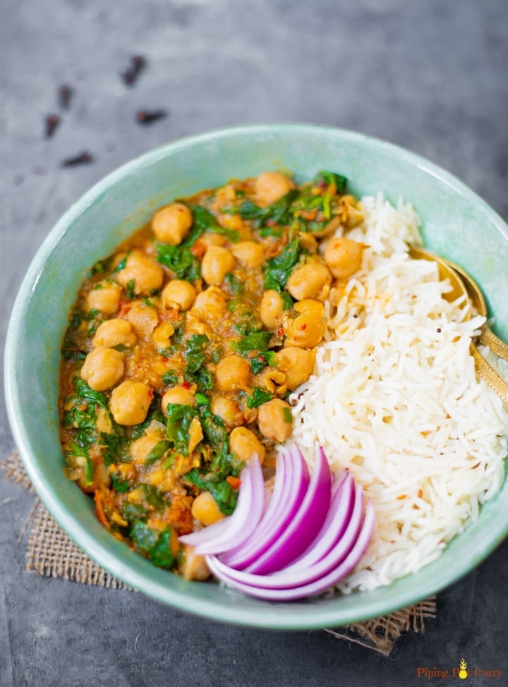 Chana Saag along with rice in a bowl