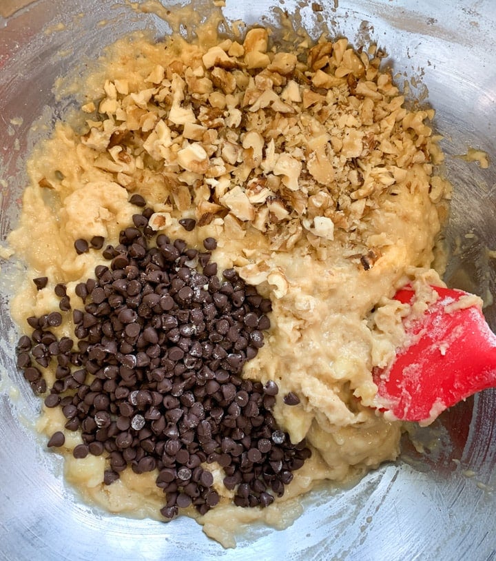 Healthy Banana Bread Steps - Piping Pot Curry-3 Mixed batter with flour topped with chocolate chips and chopped walnuts