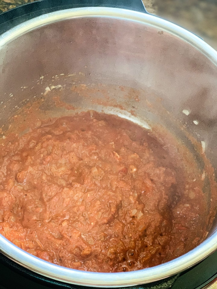 Instant Pot Coconut Chicken Curry Steps - Piping Pot Curry-3 Onion and tomato masala to make curry