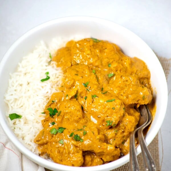 Easy Coconut Curry chicken in a white bowl
