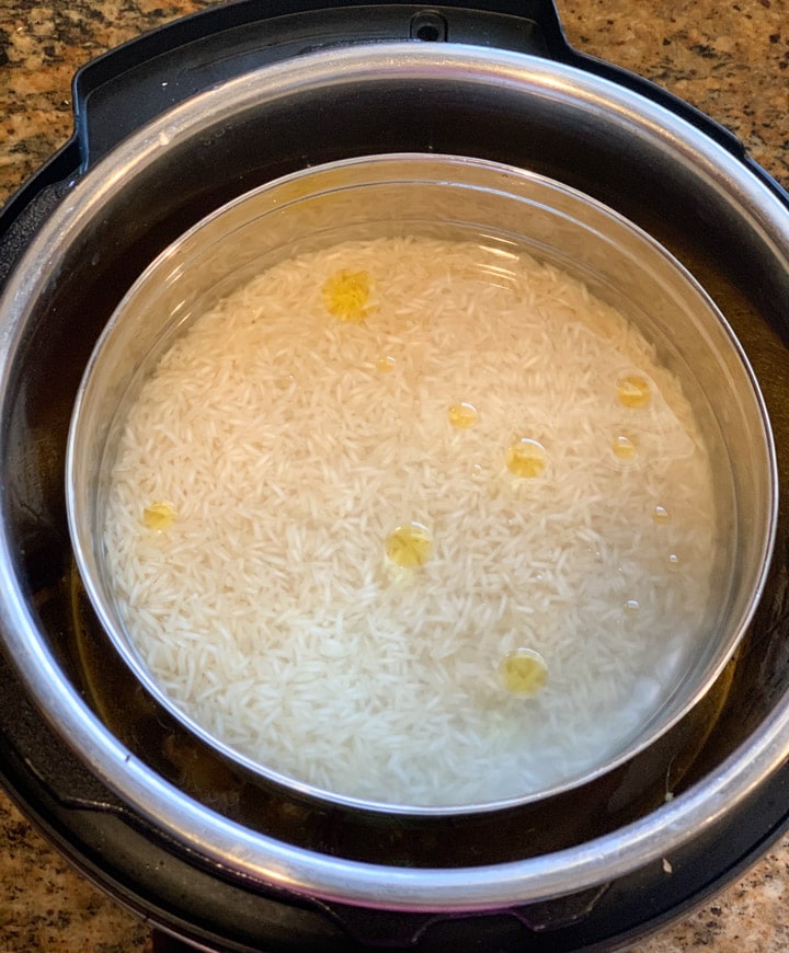 Gujarati Dal Instant Pot Steps - Piping Pot Curry-5 Pot-in-pot rice being cooked in the instant pot