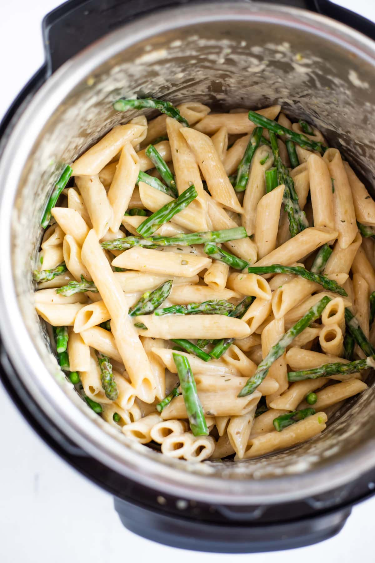 Asparagus Penne Pasta in a creamy sauce in the instant pot