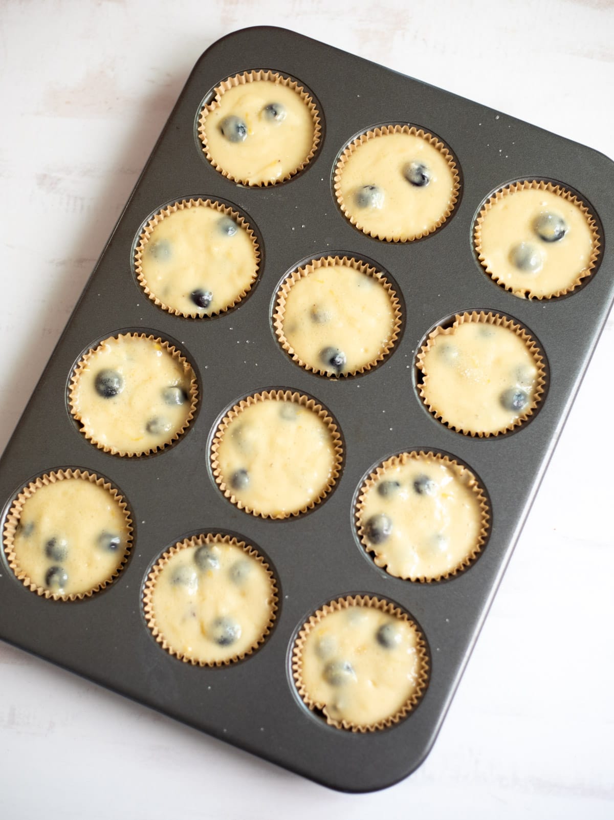 muffin pan filled with batter