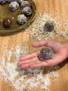 Small balls rolled by hand and then in chopped nuts and desiccated coconut