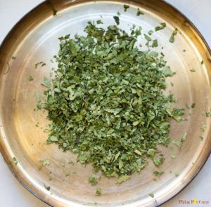 Crumbled dried curry leaves which can also be used to make curry leaves powder