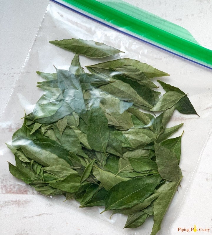curry leaves in a ziplock stored in freezer