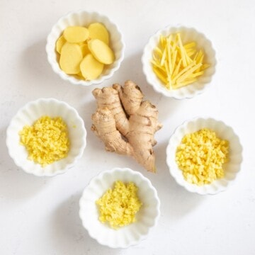 fresh Ginger root cut in 5 ways in small bowls - slice, chop, mince, julienne, grate