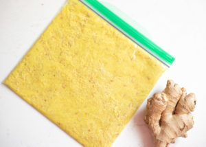 ginger paste in a ziplock bag flattened out to a thin layer