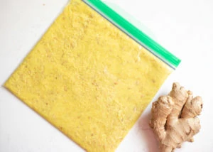 ginger paste in a ziplock bag flattened out to a thin layer