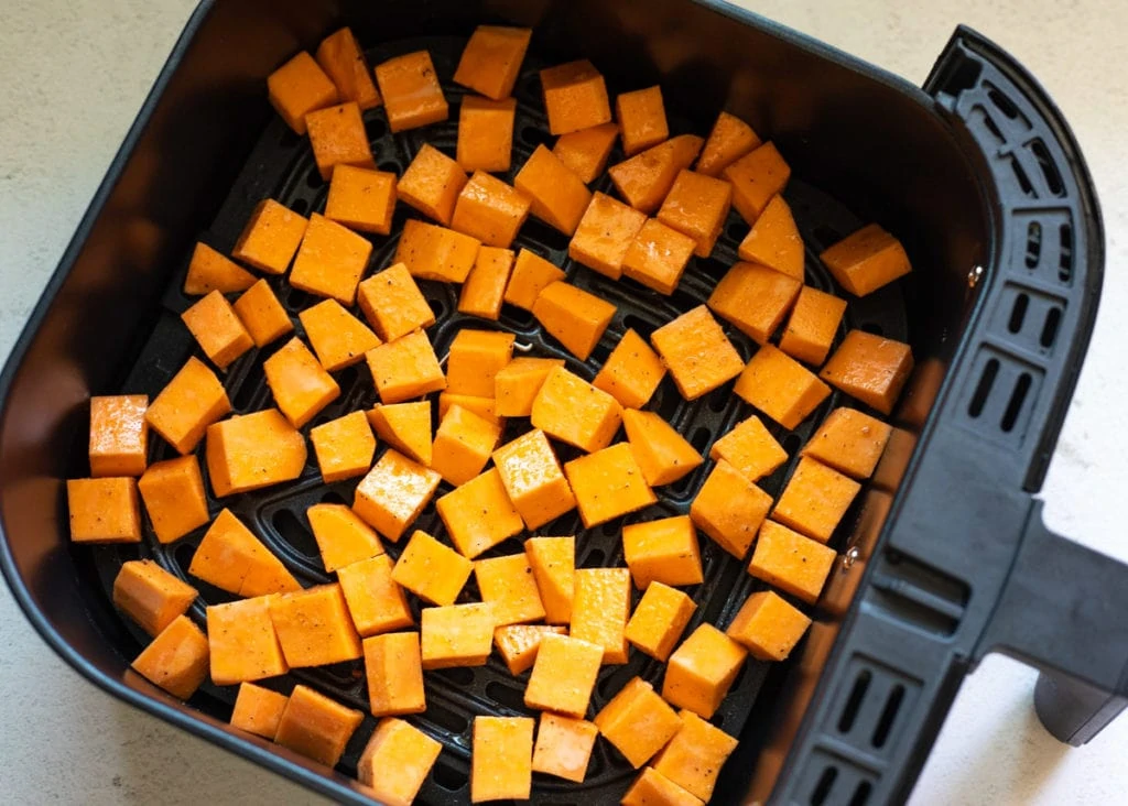 Sweet potato cubes in an air fryer