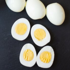 Instant pot hard boiled eggs on a black platter