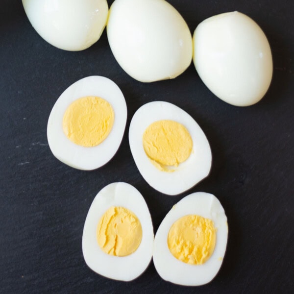 Instant pot hard boiled eggs on a black platter