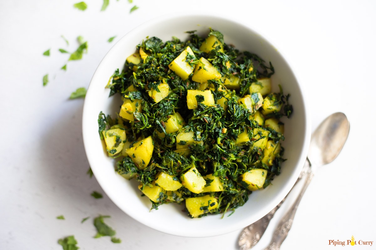 Aloo Methi in a white bowl