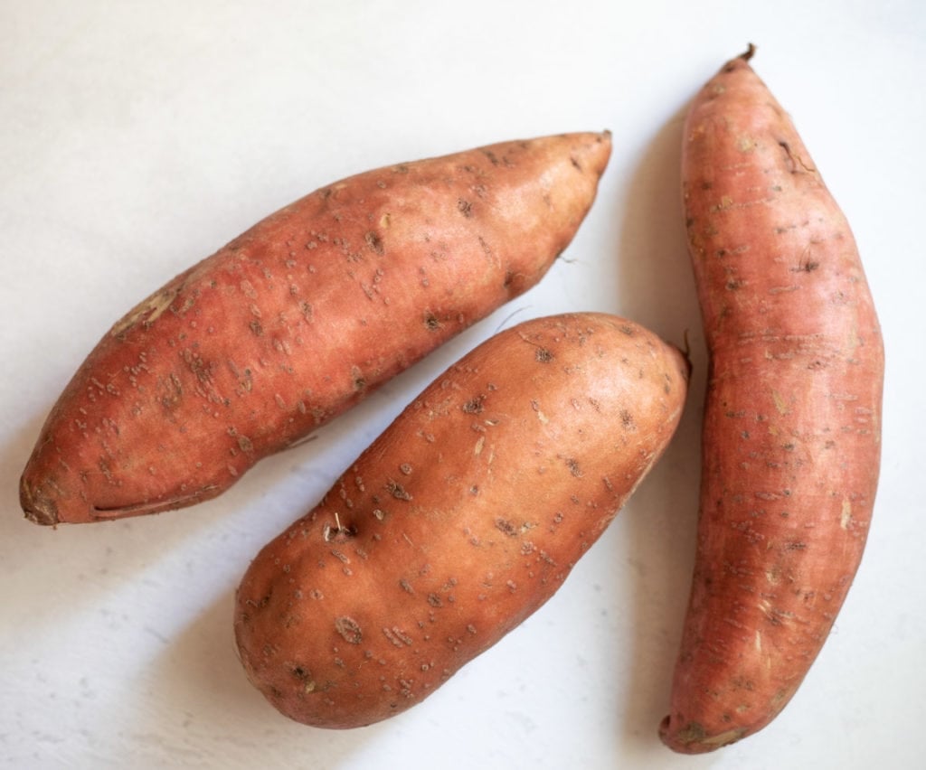 three sweet potatoes