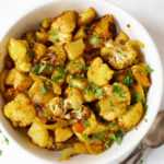 Indian Roasted Aloo Gobi (Potatoes and Cauliflower) in a bowl