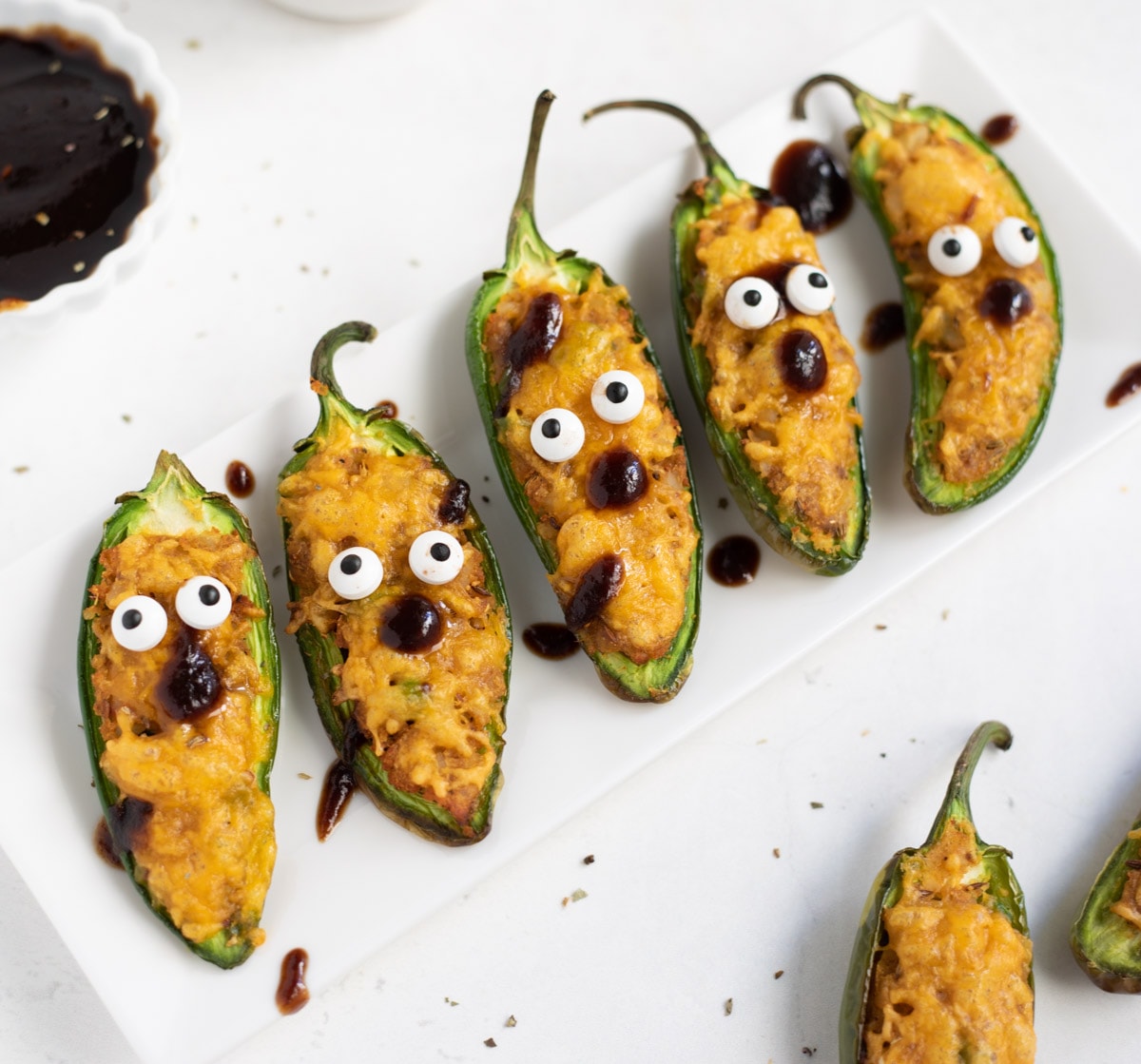 Halloween themed air fryer jalapeno poppers with cheesy potatoes 
