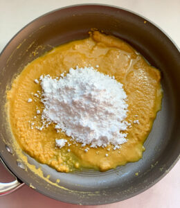 besan mixture in a pan