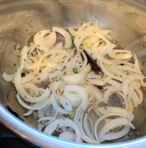 Saute sliced onion in the instant pot