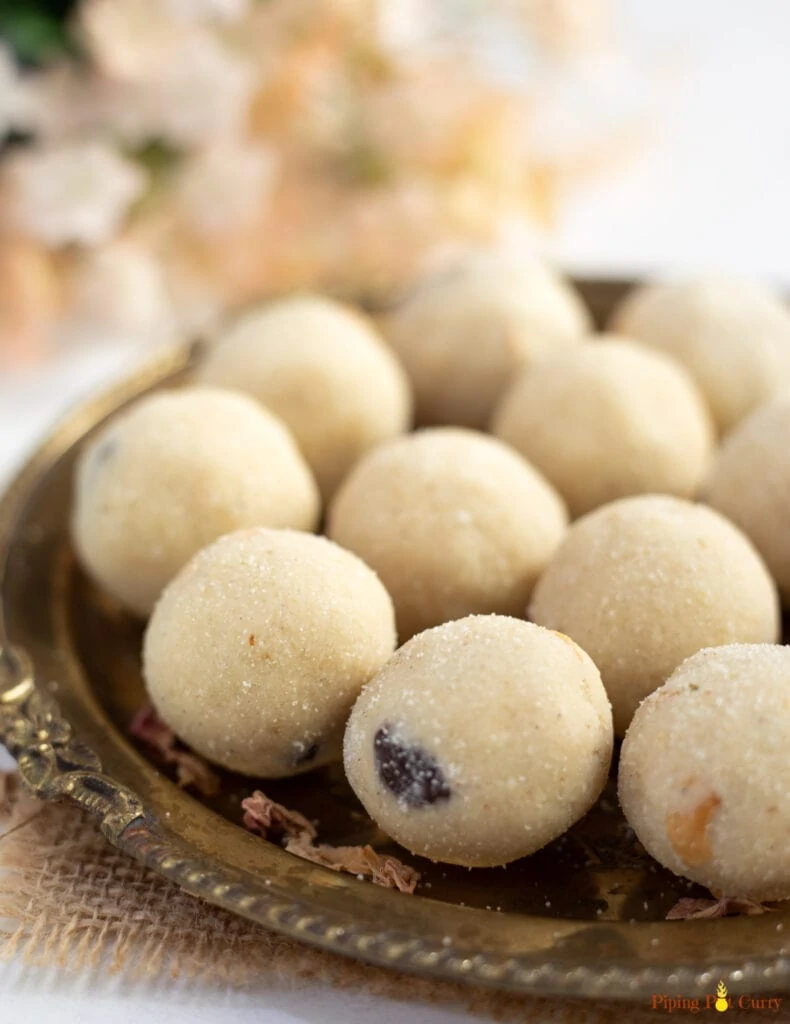 Rava Ladoo with cashews and raisins spread in a plate 