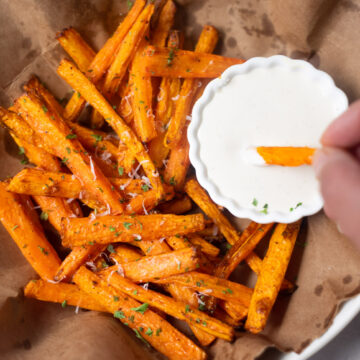 Roasted Carrots in a plate with a ranch dip
