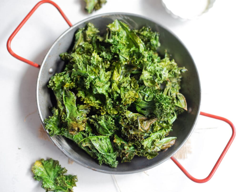 Crispy kale chips in a bowl