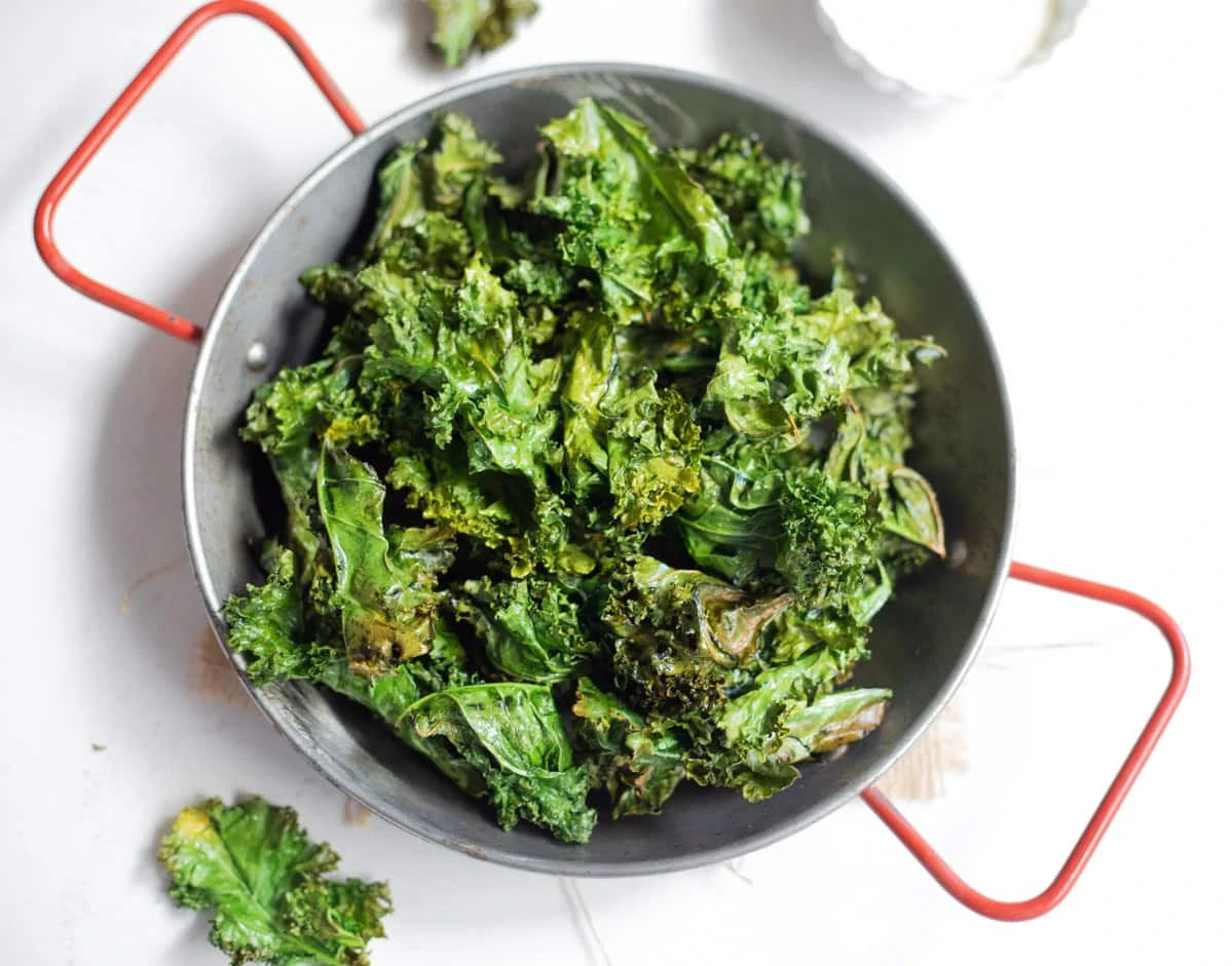 Crispy kale chips in a bowl
