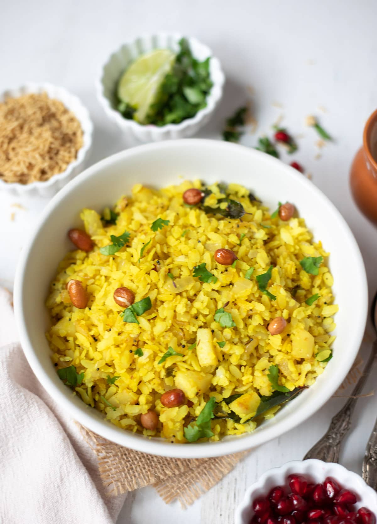 poha with garnishes and masala chai