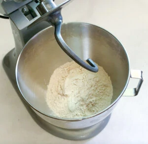 Whole wheat flour (aata) in mixing bowl of kitchenaid mixer