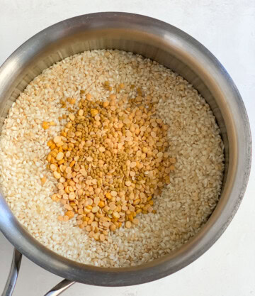 Rice and dal in a bowl to make dosa batter